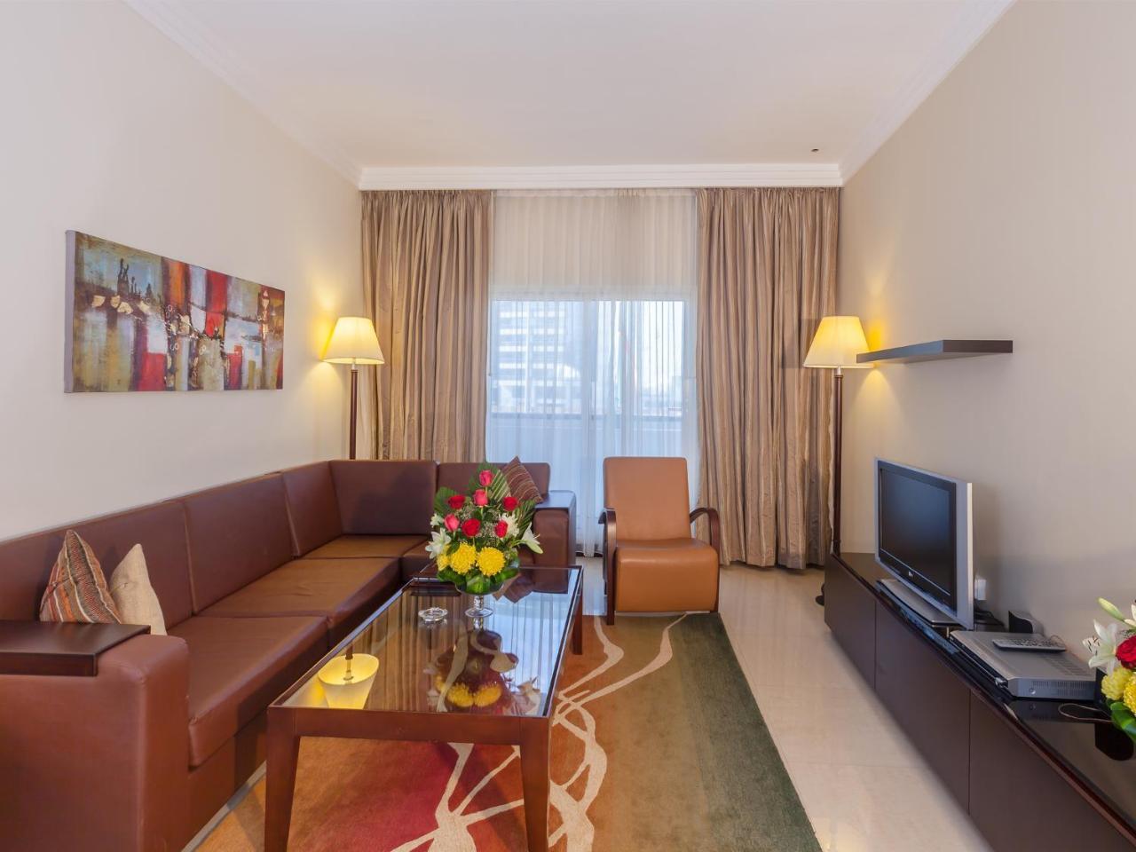 דובאי Flora Park Deluxe Hotel Apartments מראה חיצוני תמונה